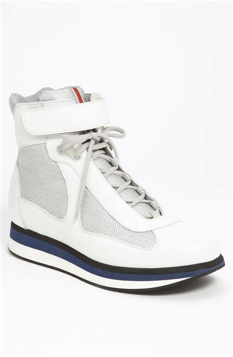 prada white high top sneakers.